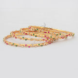 Designer Set of Four Bangles in Gold Micro Polish